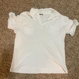 White Tee with 2 front pockets. Color: White